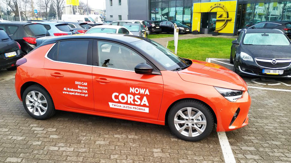 Pomarańczowy Opel Corsa jazda testowa Warszawa